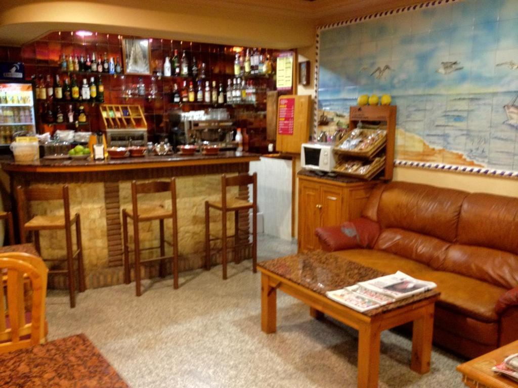 Hostal Los Corchos in Fuengirola: Find Hotel Reviews, Rooms, and Prices on